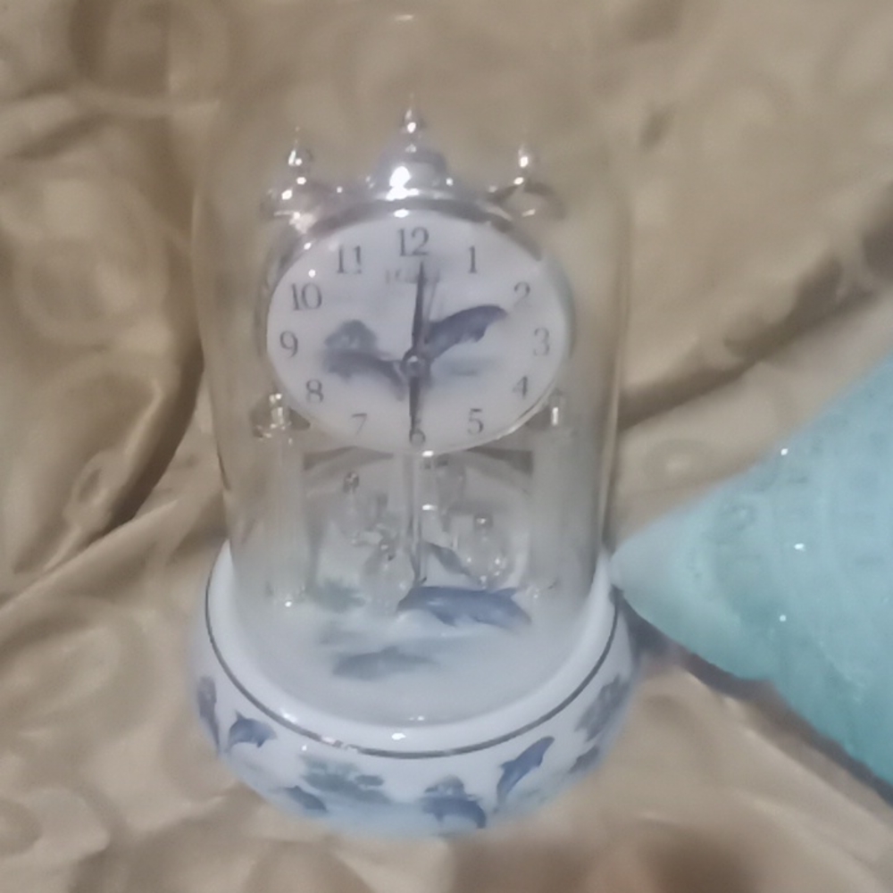 Classic vintage dolphin clock